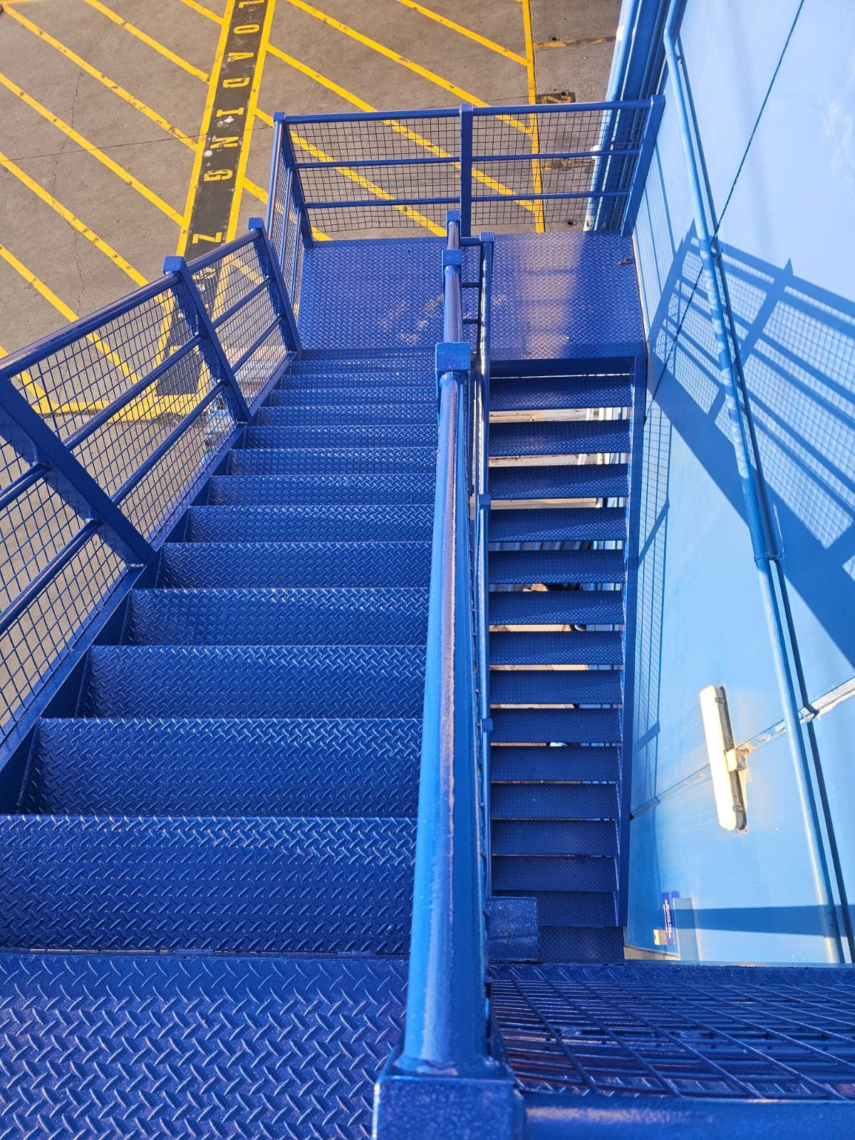 External fire stair, finished, painted by Mak Paints in Melbourne